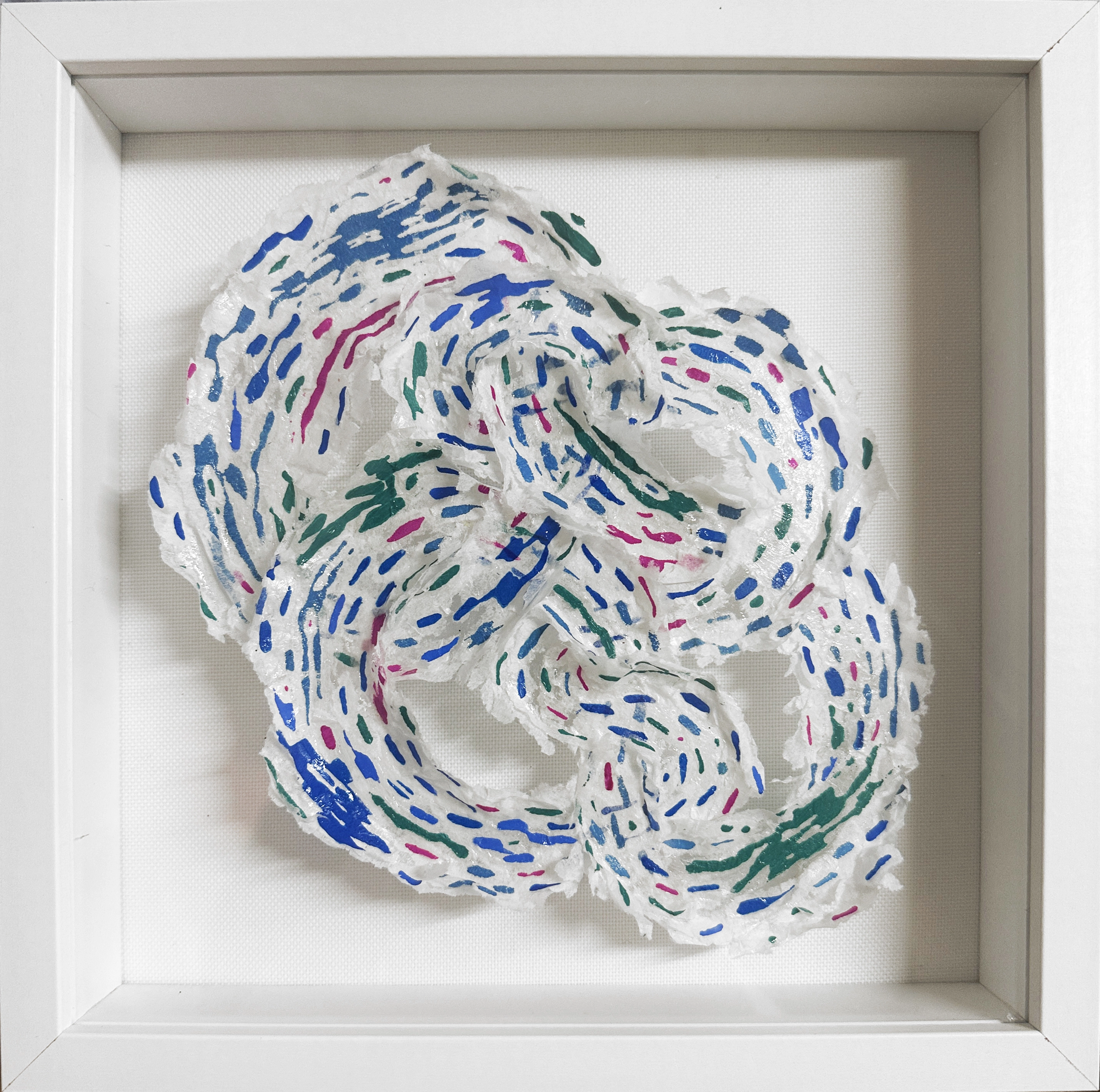 Proto Universe 05.23.26 — a small framed screen-print collage knot in blue, green and magenta.